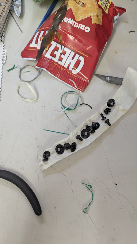 A lot of wires and circles made of electrical tape, masking tape, hot glue, some pieces of rubber band. It's not a very good looking desk, very disorganised, you're lucky that you have trouble seeing it, trust me.